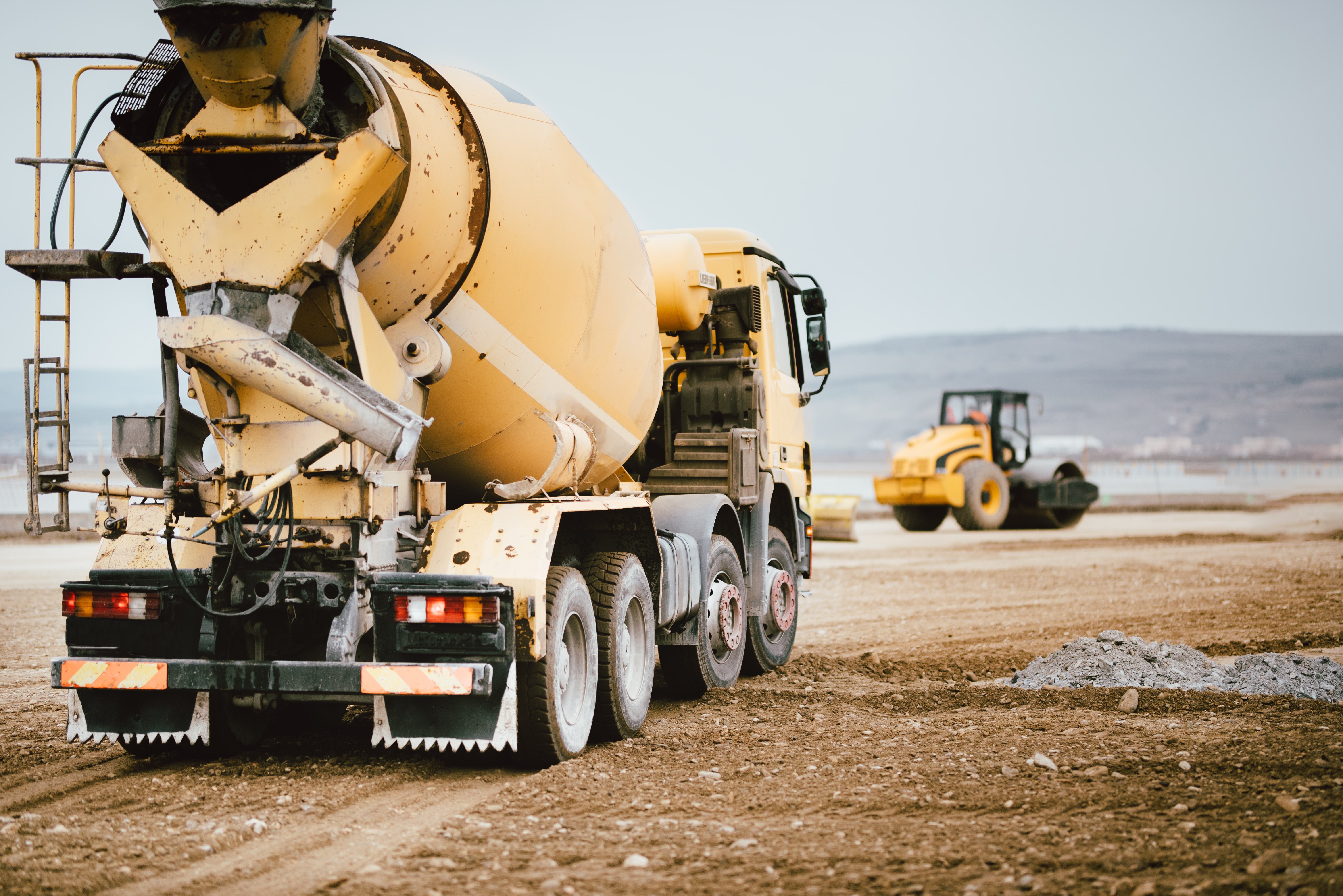 Industrial Cement truck on highway construction site.